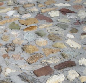 boulders in plum concrete